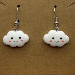 NWT - Cute Cloud Earrings - 1 x .5 inches - cute smiley face clouds